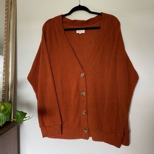 dark orange ribbed buttoned cardigan sweater